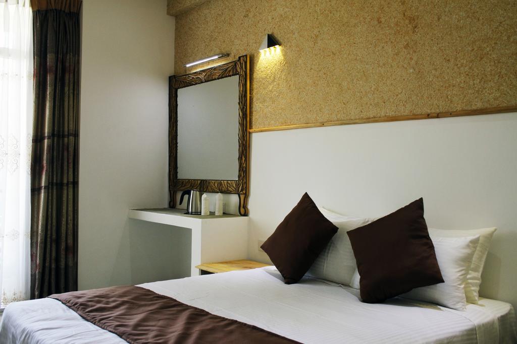 The Tenth Hotel Ella Quarto foto
