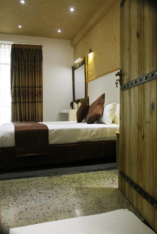 The Tenth Hotel Ella Quarto foto